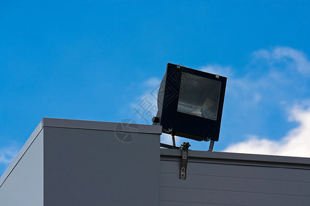卤素投射器建筑物投影仪天空电气照片聚光灯蓝色背景图片