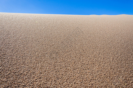 沙滩沙沙粒细节背景图片