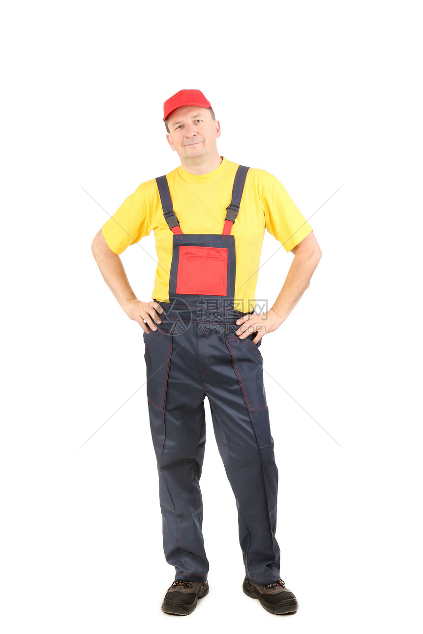 男人穿着工作服 手放在臀部工具蓝色建筑工作服务管道员工职业安全帽橙子图片
