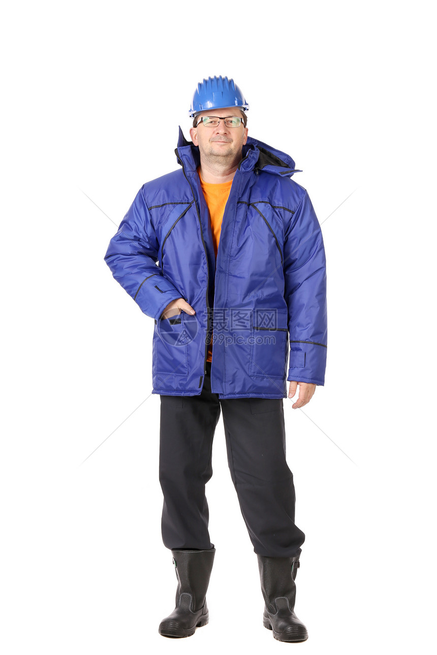 穿冬装和硬帽的男人身体机械员工建造橙子承包商工人权限工作服务图片