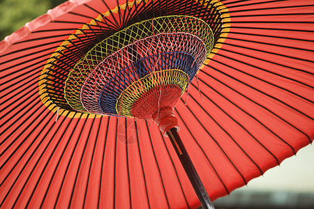 红色抛物线底侧遮阳棚阳伞太阳伞底面背景图片