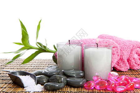 瑜伽或桑浴用品毛巾甘蔗粉色按摩石头竹子鹅卵石配件蜡烛桑拿背景图片
