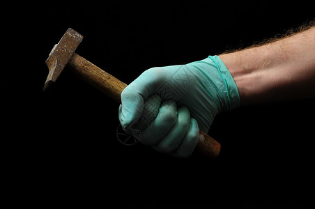 锤和手力量工艺维修工作工人工具金属黑色乐器木工背景图片