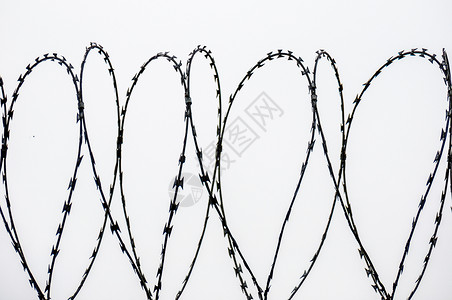 刺绣钢丝金属外壳障碍安全边界铁丝网背景图片