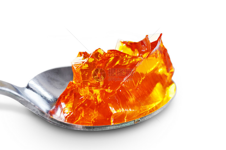 满是橘子果冻的勺子橙子着色剂乐趣折射幸福食物白色添加剂明胶化学品图片