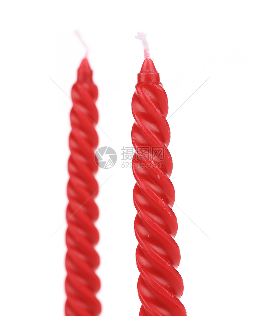 两根红螺旋蜡烛烛光装饰品红色火焰灯芯魅力宏观黑暗派对图片