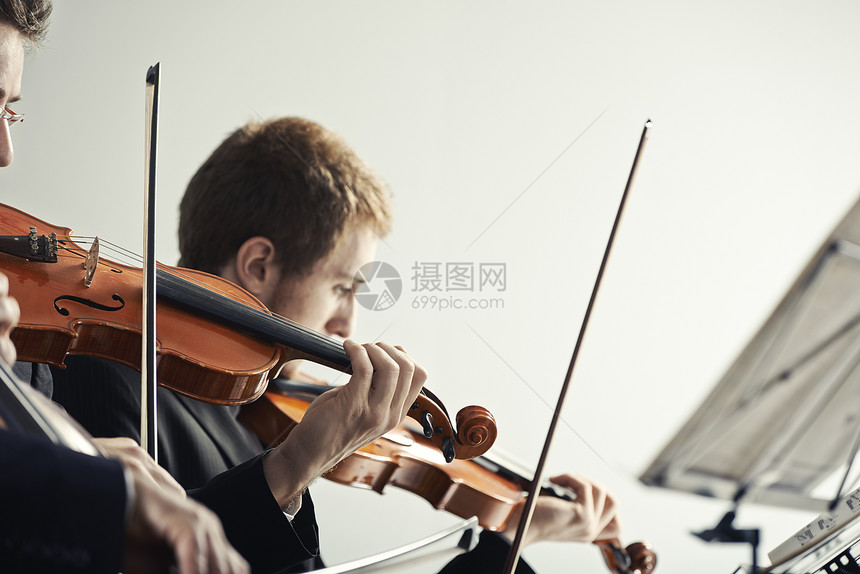 古典音乐 音乐会娱乐小提琴乐器男性音乐音乐家乐谱团队男士交响乐图片