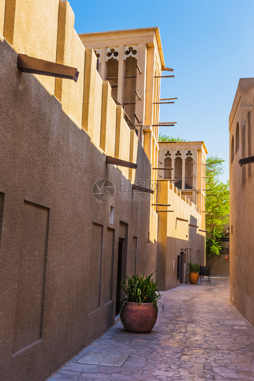 迪拜旧街的阿拉伯街道建筑建筑学旅游隧道石头街道历史旅行路面场景图片