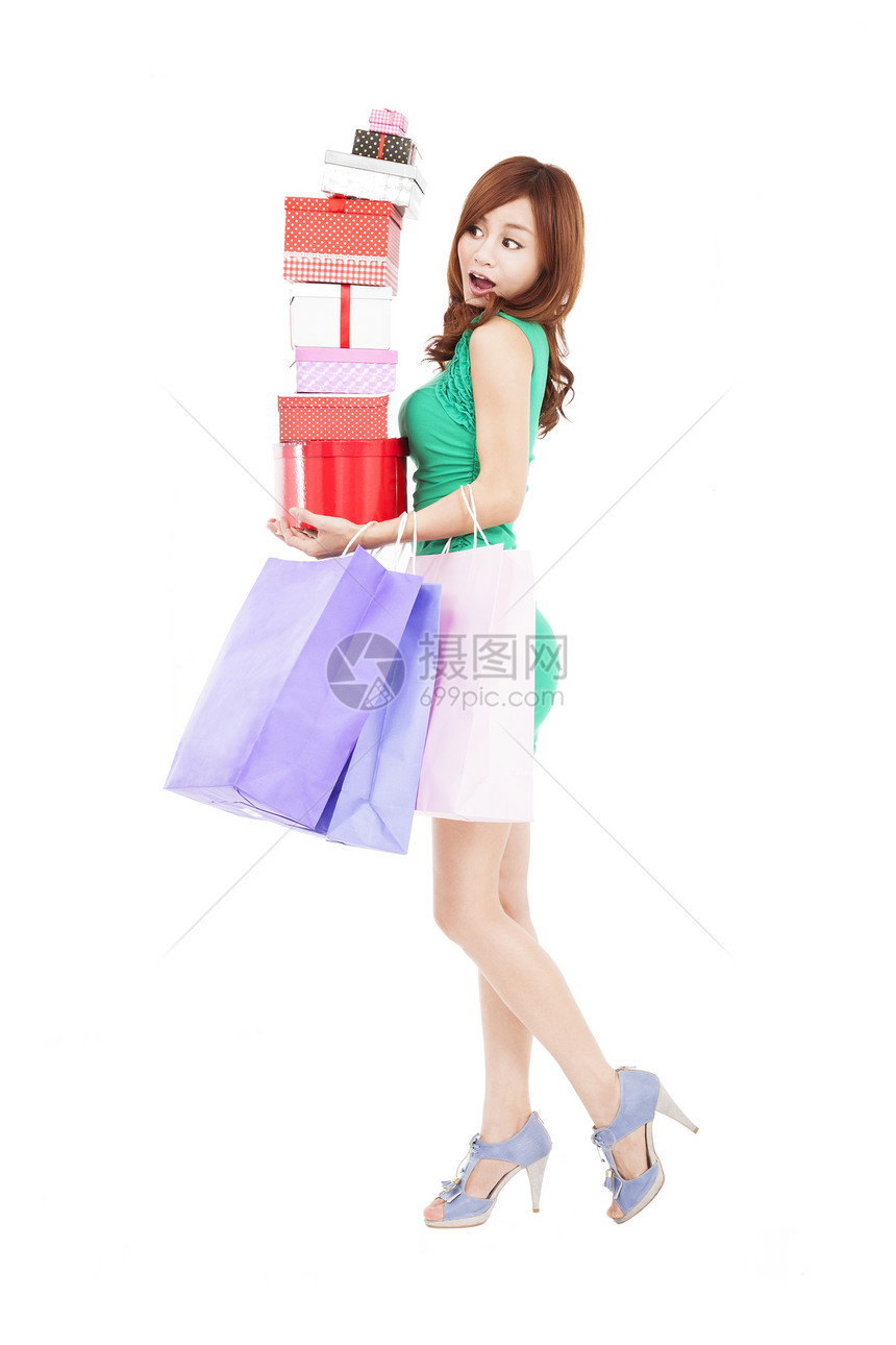 拿着礼品盒和购物袋的年轻女性惊讶享受顾客白色乐趣销售消费者盒子幸福零售女士图片