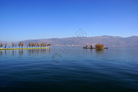 中国云南省达利Erhai湖蓝色全景钓鱼村庄旅行文化码头天空城市天气背景图片