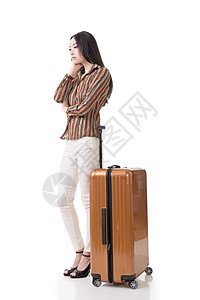 手提箱妇女流动亚洲妇女行李乘客手提箱游客女士旅行旅游女性姿势背景