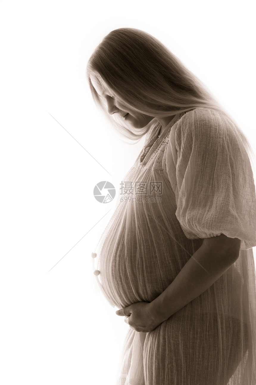 与世隔离的孕妇母性生活女性腹部怀孕父母女士金发女郎婴儿母亲图片