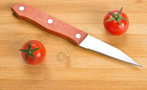 短厨房刀木板蔬菜用具背景图片