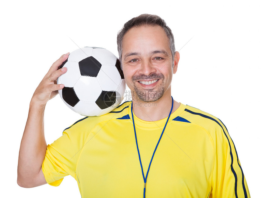 快乐的男子拿着足球舞会的肖像图片