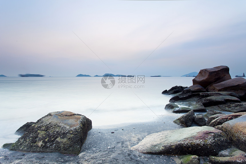 日落时的海景公园海洋海岸支撑日历石头魔法天空戏剧性风暴图片