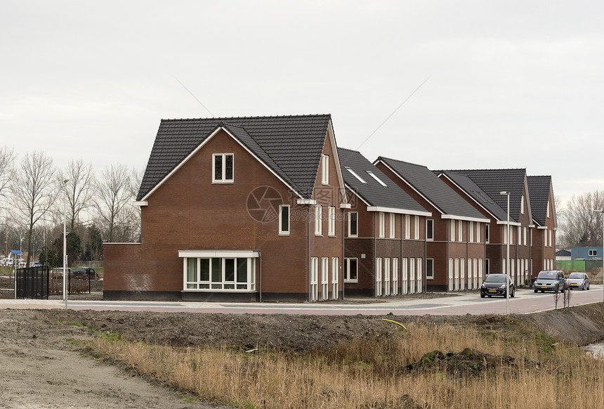 在Holland建造新房屋房地产住宅汽车开发水平入口建筑外观结构街道图片