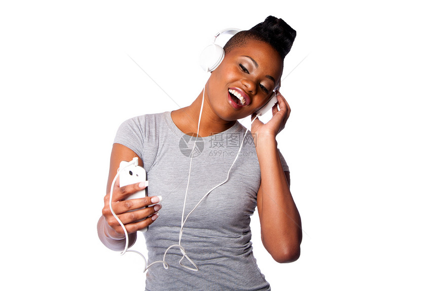 听音乐的漂亮女人啊耳机喜悦唱歌电话玩家快乐乐趣开槽白色幸福图片