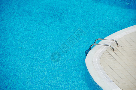 游泳池蓝色温泉水池游泳背景图片
