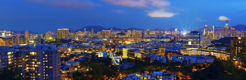 香港市之夜日落港口天空经济蓝色商业城市金融摩天大楼顶峰图片