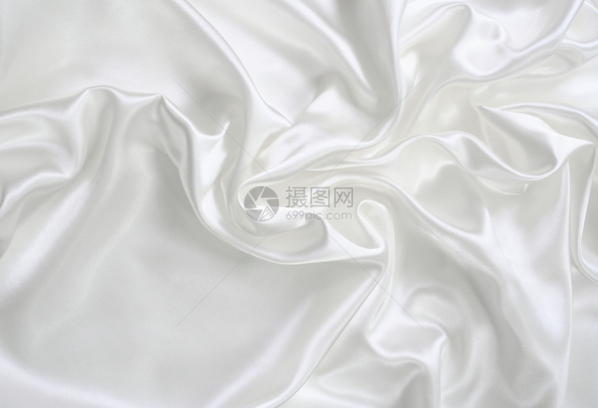 作为婚礼背景的平滑优雅白色丝绸海浪织物投标曲线涟漪纺织品折痕材料布料银色图片