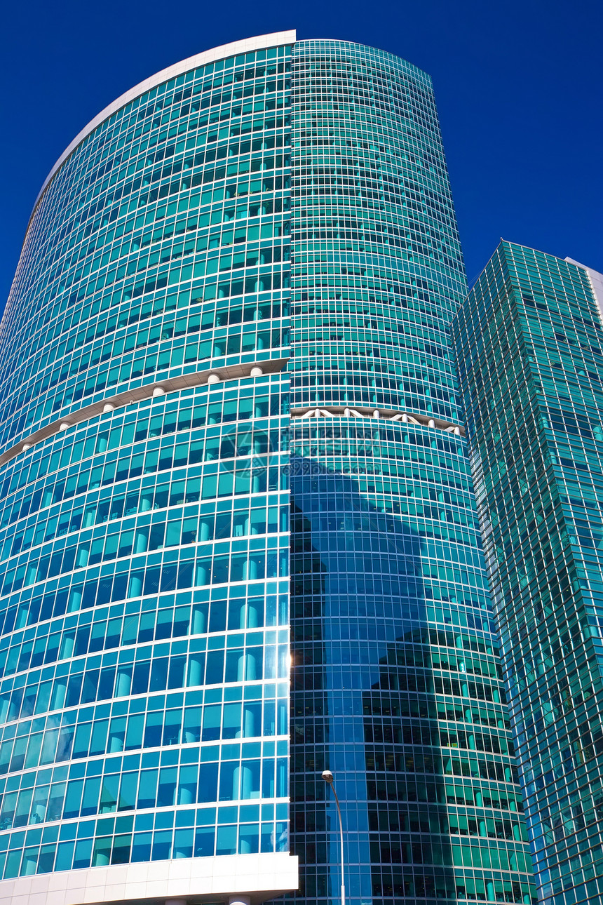 现代系统扩张者技术城市摩天大楼场景房子商业蓝色建筑窗户反射图片