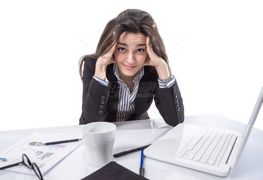 头脑中握着双手的紧张的商业妇女白色危机电脑女孩压力疲劳挫折人士商务成人图片