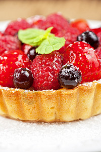 新鲜果子蛋糕叶子盘子奶油水果甜点食物餐厅巧克力蓝色馅饼草莓高清图片素材
