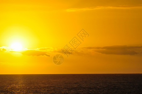 热带热带光辉日落地平线太阳海洋海滩天空日出阳光背景图片