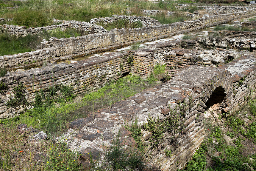 迪翁古老的废墟宗教考古学旅游雕像女神避难所手工酒神石头人行道图片