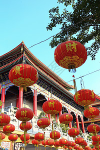 在新年节日的中国灯笼旅行风格装饰品佛教徒庆典运气财富传统装饰祷告背景图片