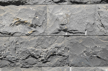 黑色岩浆砖纹理砖纹鹅卵石火山质感模式建筑复古水泥墙纸材料背景图片