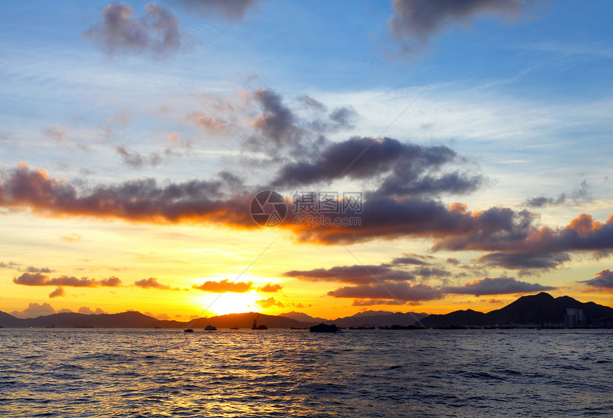 日落时的海景石头阳光海滩风暴海岸线太阳海洋支撑海岸热带图片