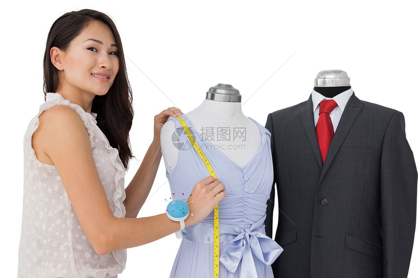 女时装设计师和女模特服装裙子织物模特儿工艺女士衣服创造力裁缝商业图片