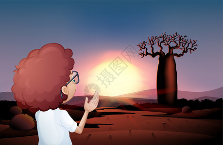给树浇水男孩一个在沙漠中看日落的卷毛男孩设计图片