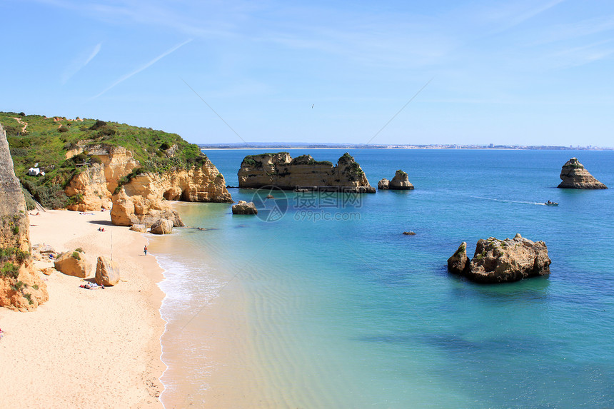 葡萄牙拉各斯海洋旅游晴天岩石悬崖海岸海岸线旅行蓝色海滩图片