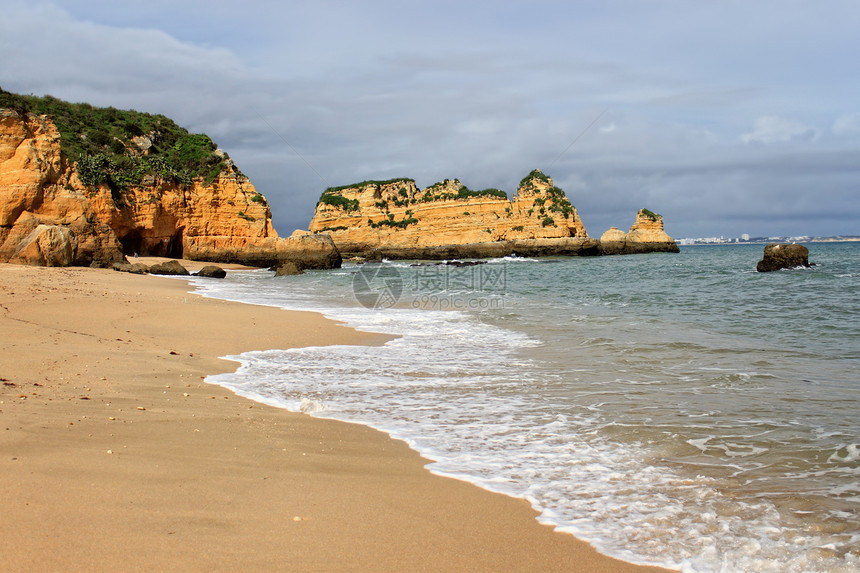 葡萄牙拉各斯海岸线海洋岩石海岸悬崖海滩砂岩旅行赭石旅游图片