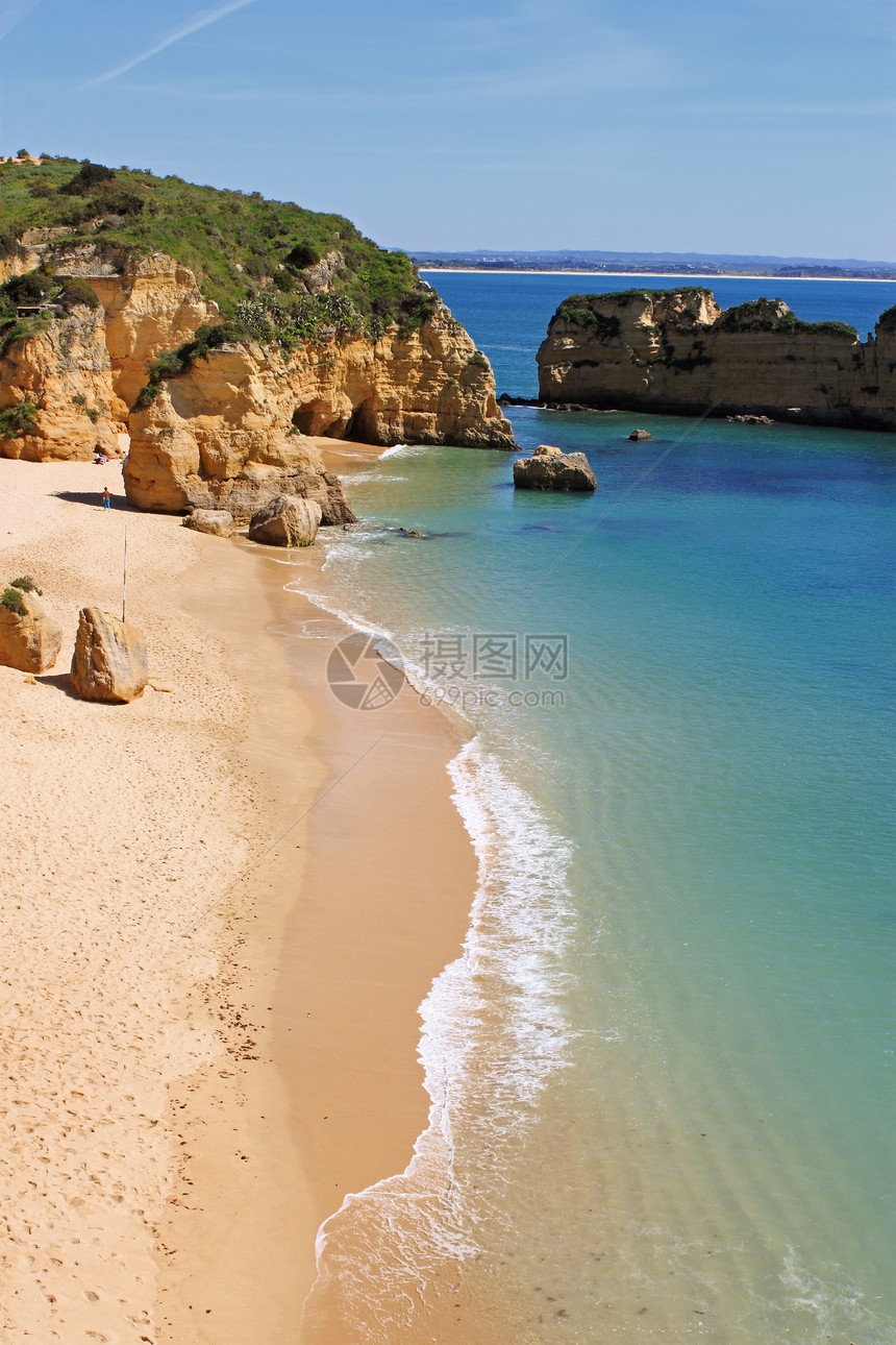 葡萄牙拉各斯旅游海岸线旅行蓝色海岸海洋悬崖岩石晴天海滩图片
