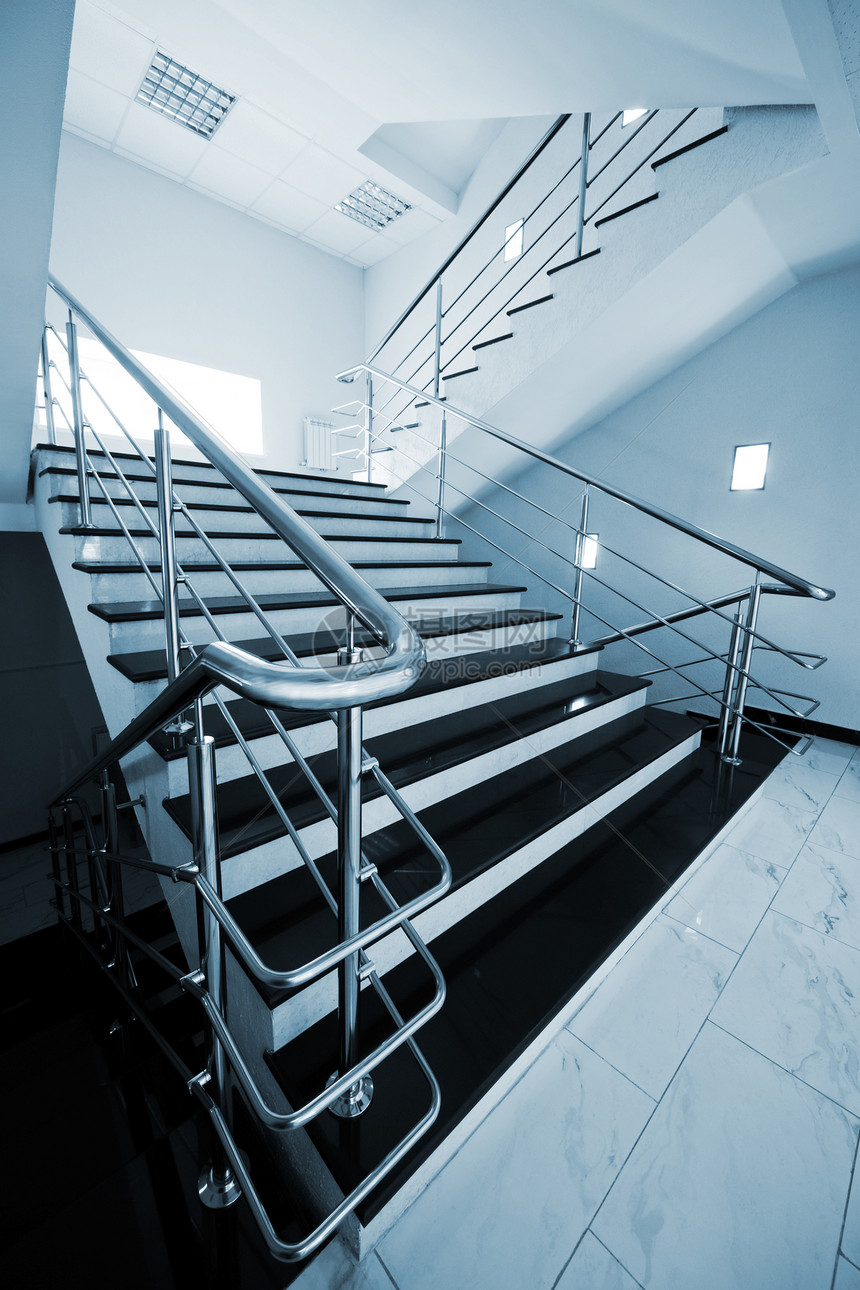 用钢铁扶手的楼梯建筑大厦曲线酒店入口栏杆建筑学住宅财富职业图片