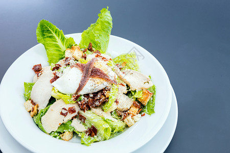 塞萨尔萨拉德食物熏肉小吃长叶蔬菜美食饮食面包午餐餐厅背景图片
