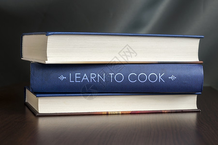 学烹饪 书的概念蓝色饮食食欲教育知识美食图书图书馆桌子食谱背景图片