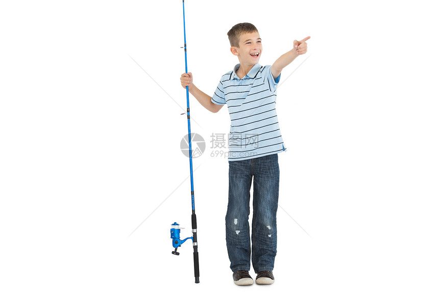 持有渔棍指针的年轻男孩图片