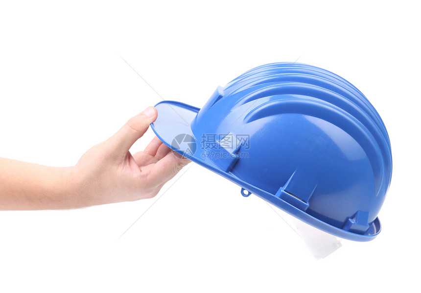 握着蓝色硬帽的手建造头饰联盟男人承包商安全制造业工作生活剪裁图片