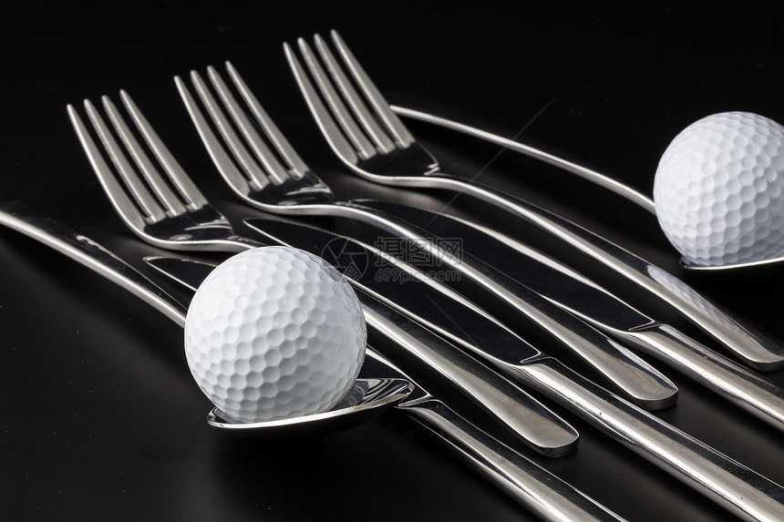 叉子 勺子 刀和刀以及高尔夫球黑色刀具圆圈白色厨师球座晚餐午餐烹饪运动图片