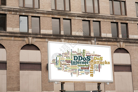 无字广告素材在砖墙上挂有 DDOS 字云符号的广告广告公告牌金融框架海报建筑学商业办公室水平城市白色蓝色背景