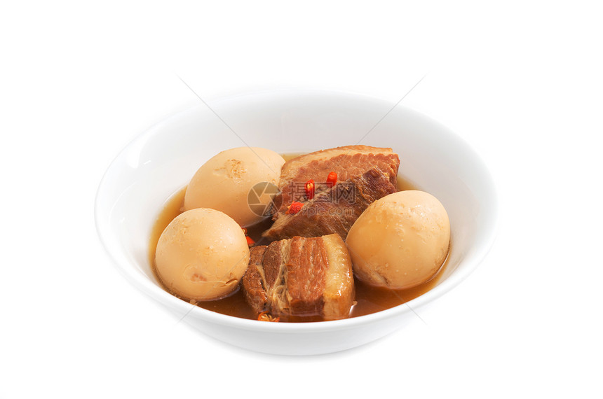 越南焦糖猪肉肚和硬的红色节日果汁猪肉椰子腹部辣椒新年午餐高架图片