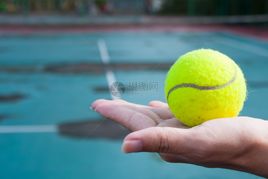 网球在手边比赛锻炼闲暇体育场服务娱乐游戏角落运动法庭图片