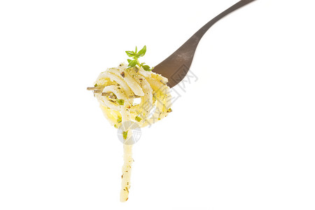 叉子上的意大利面条食物白色叶子美食香蒜背景图片
