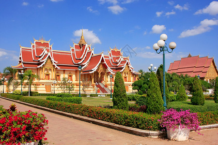 花园建筑老挝万象Luang建筑群的寺庙城市花园景观纪念碑首都文化国家佛塔佛教徒旅行背景