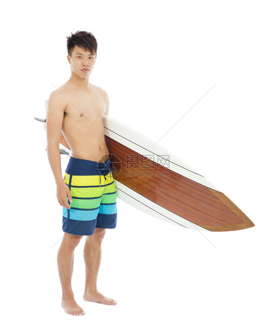 年轻男孩在白色背景上持冲浪板消遣热情海浪海岸海洋假期爱好运动喜悦快乐图片
