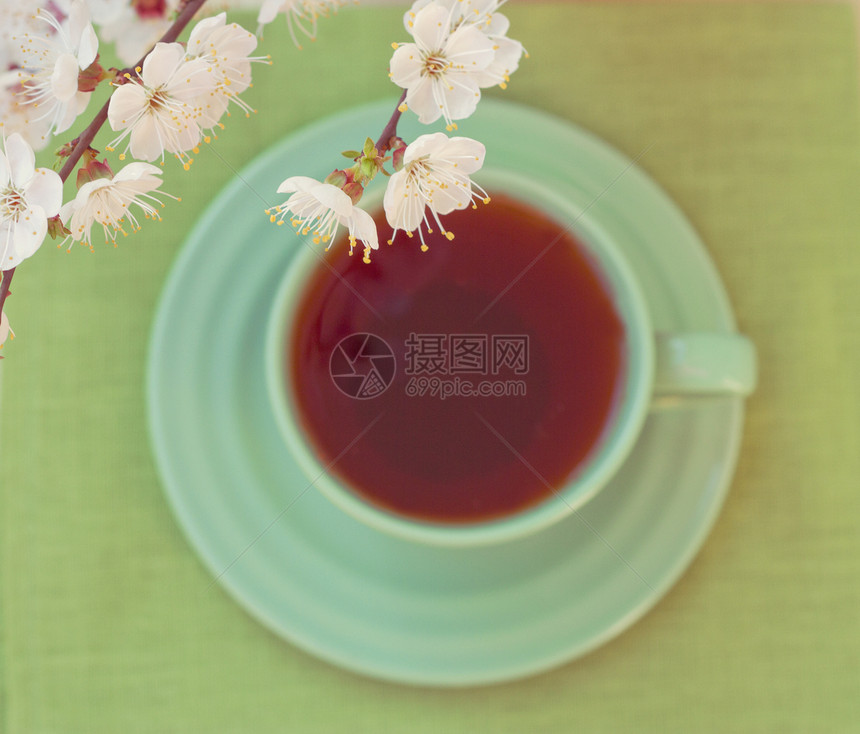 绿色茶杯 从上方查看棕色红茶白色早餐花草花朵香气咖啡热饮咖啡店图片